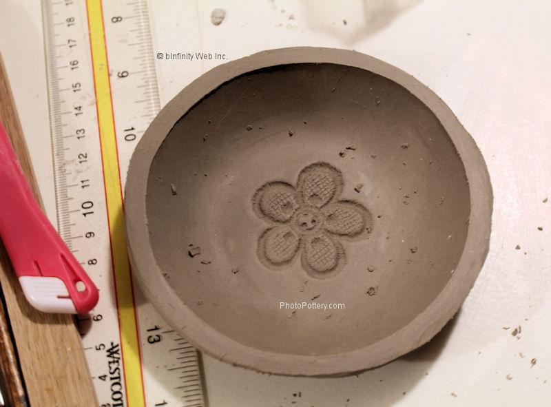 Take clay off the plaster hump mold when it can hold its bowl shape