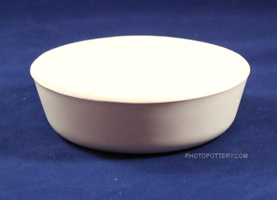 Plaster hump mold to make small pottery cat bowls. Drape rolled-out slabs over mold to hand-build cat bowls. Plaster hump mold to make small pottery cat bowls. Drape rolled-out slabs over mold to hand-build cat bowls.