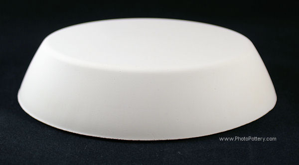 Oval drape mold in plaster to hand-build individual serving dishes, ceramic soap dishes, jewelry trays. Mold shown inverted. 