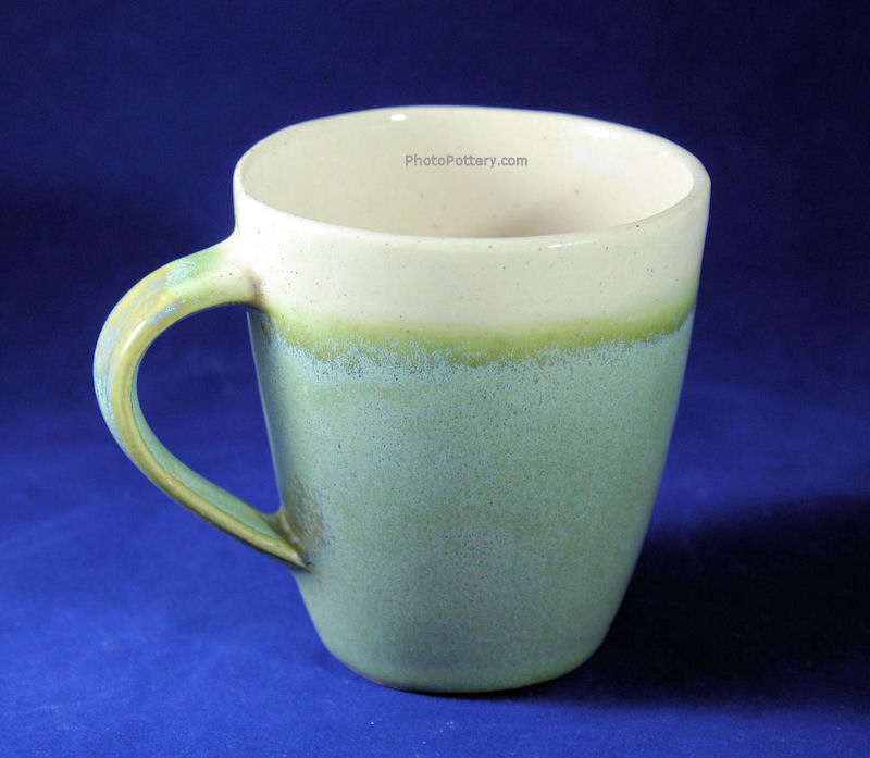 Glazed porcelain coffee mug, cone 6, made on plaster cup mold