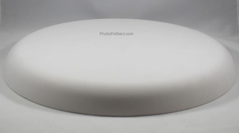 Plaster hump mold for making plates and platters. Mold is shown inverted. 