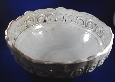 Sample Stoneware pottery bowl made using large round hump mold, slab and coils.