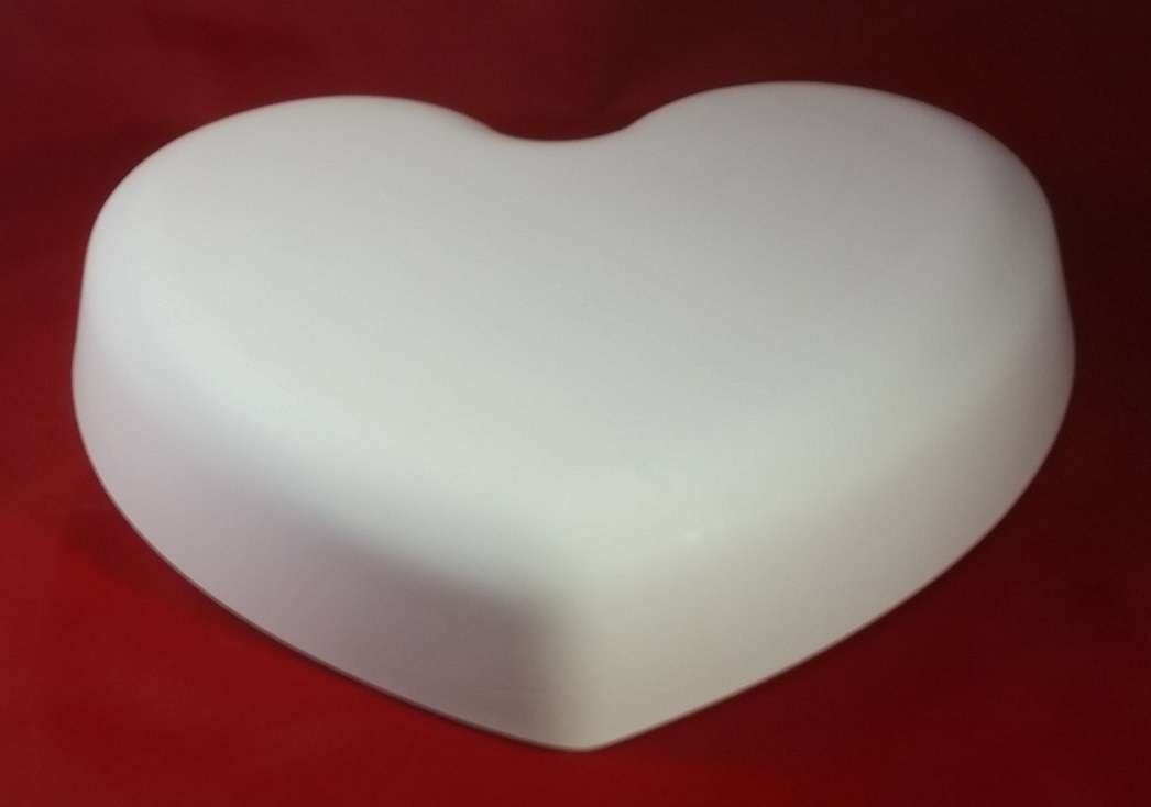 Heart Shaped Hump Mold, Made of Plaster, for draping clay to make pottery. Heart Shaped Hump Mold, Made of Plaster, for draping clay to make pottery.