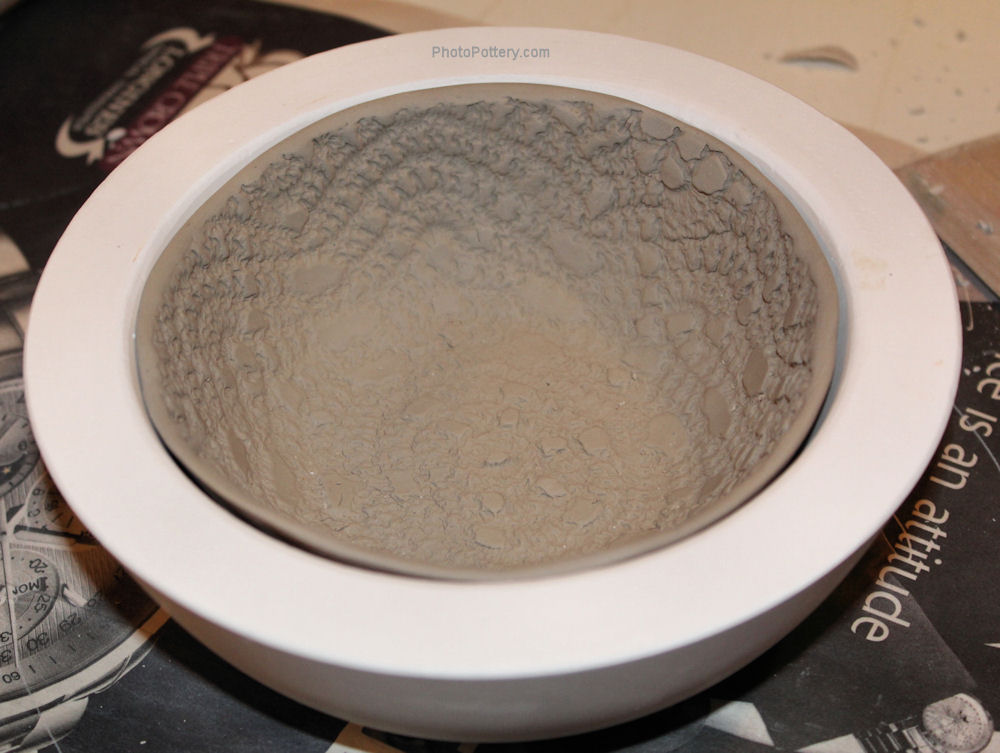 Pottery bowl made using slump mold: slab first textured then progressively slumped into mold. Porcelain clay, greenware.